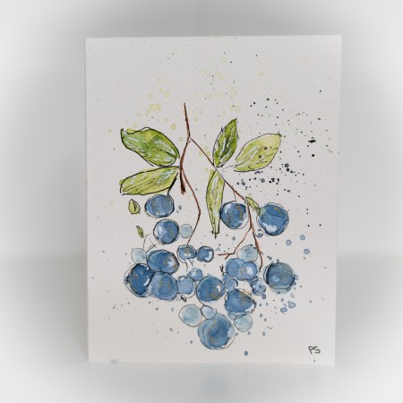 A greeting card featuring a painting of blueberries on a branch.