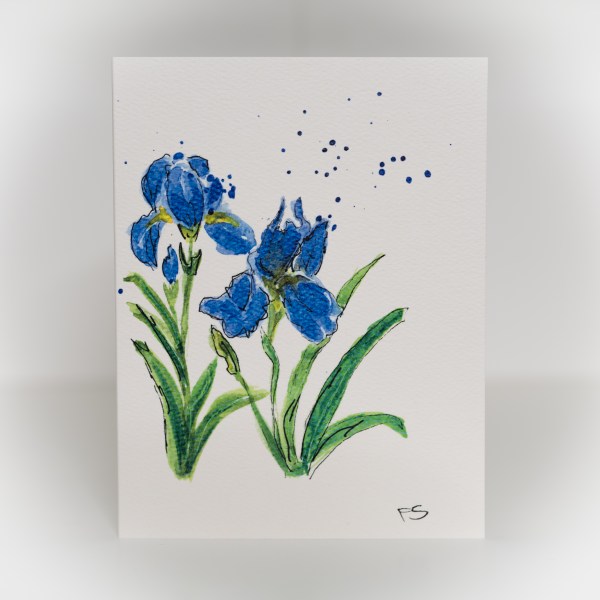 A greeting card featuring a painting of blue iris flowers
